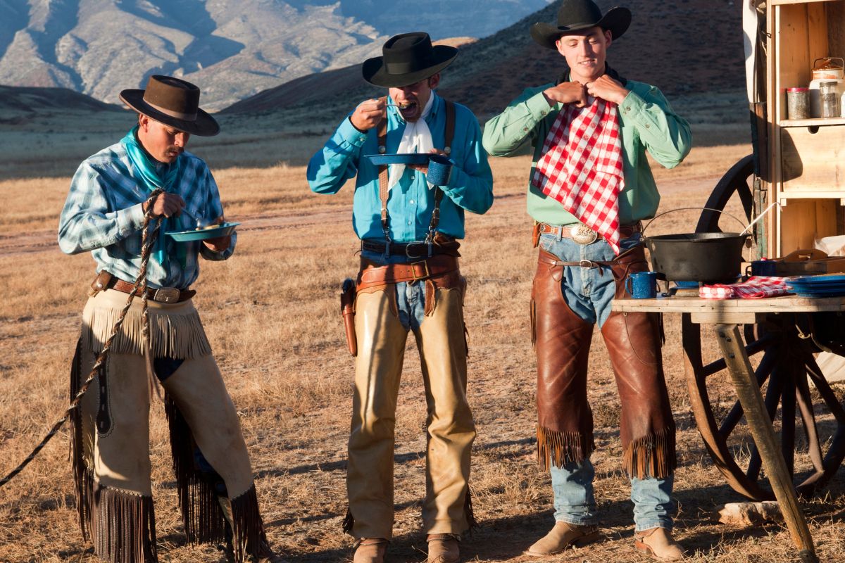 Three cowboys with chaps