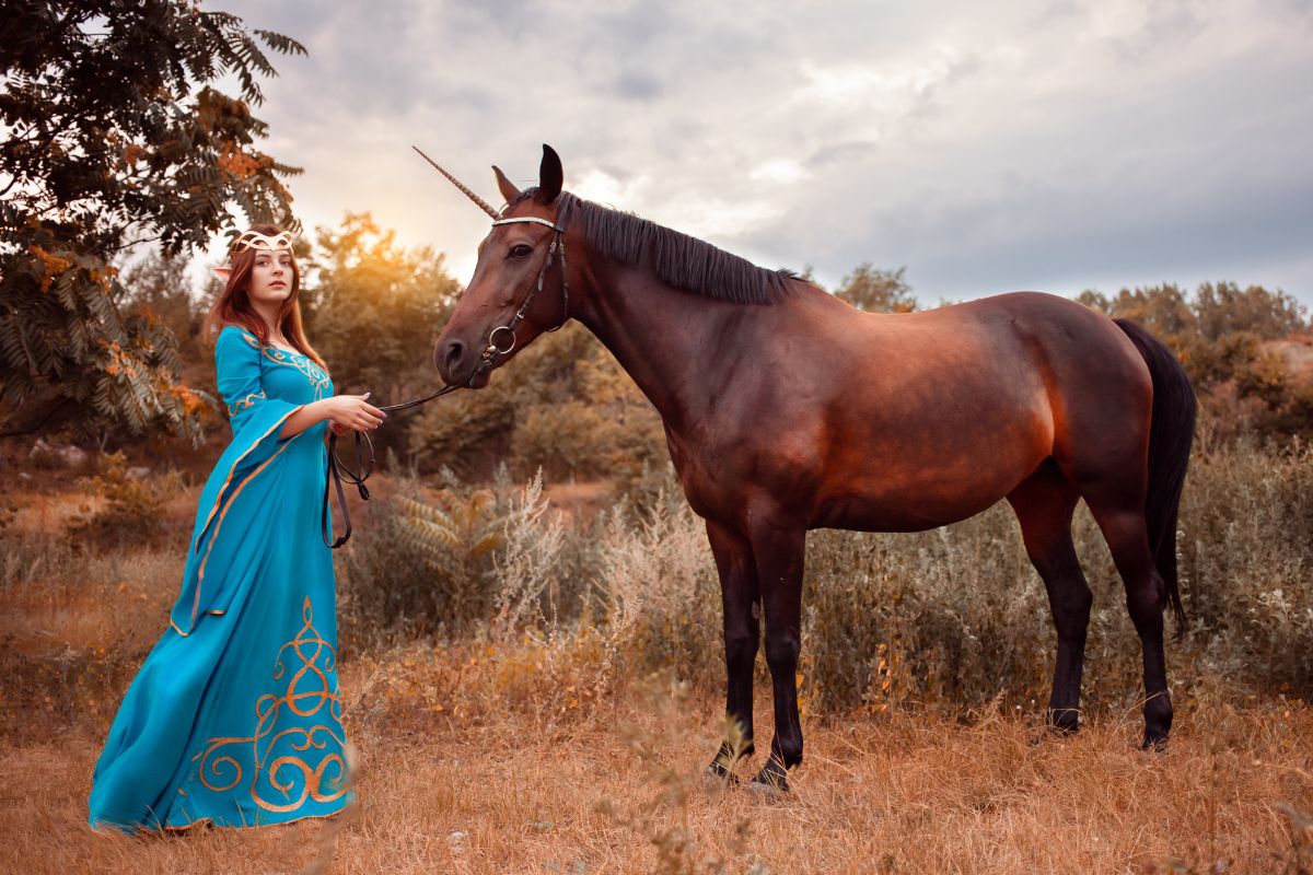 Woman and horse with elf fantasy costume